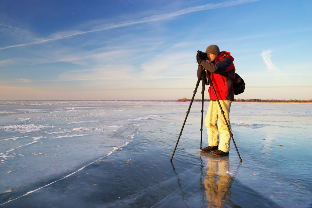 Photographer on work. Winter location.