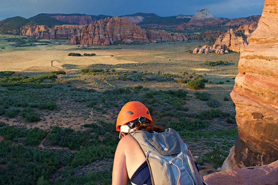 Looking over the edge on before a big rappel on our Zion canyoneering adventure