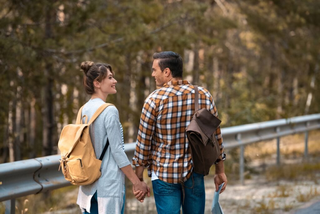 Affectionate Couple holding hands while hiking