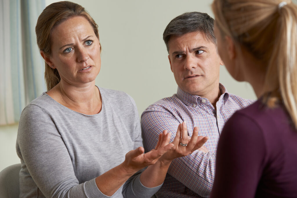 Couple Discussing Problems With Relationship Counsellor