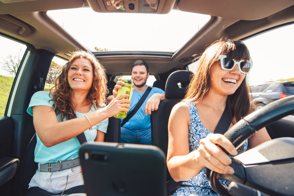 group of people travel by car. road trip concept. view inside