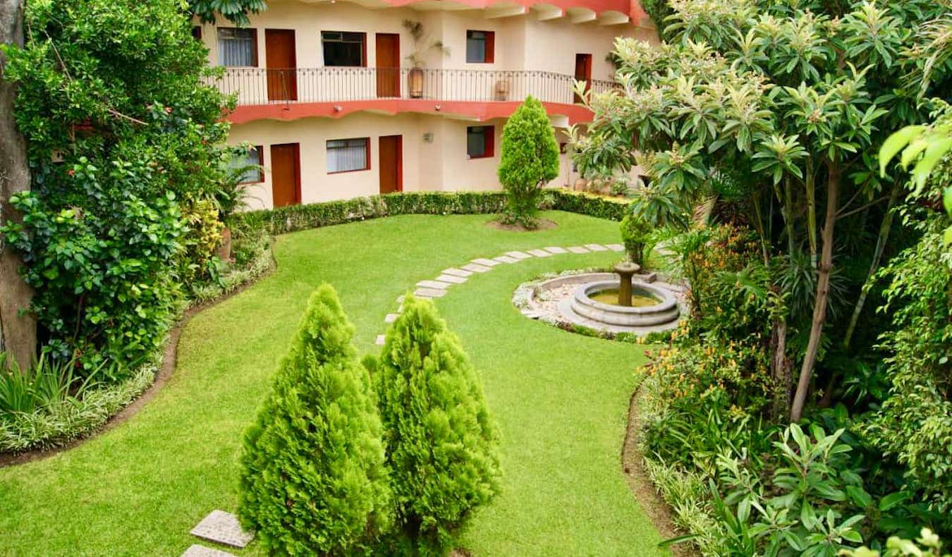 A relaxing outdoor courtyard at at three-star hotel in sunny Oaxaca, Mexico