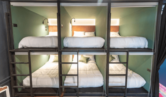 Capsule-style beds at Casa Tunki, an upscale hostel in Cusco, Peru